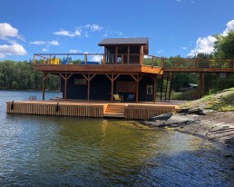 Boathouse with seating area above